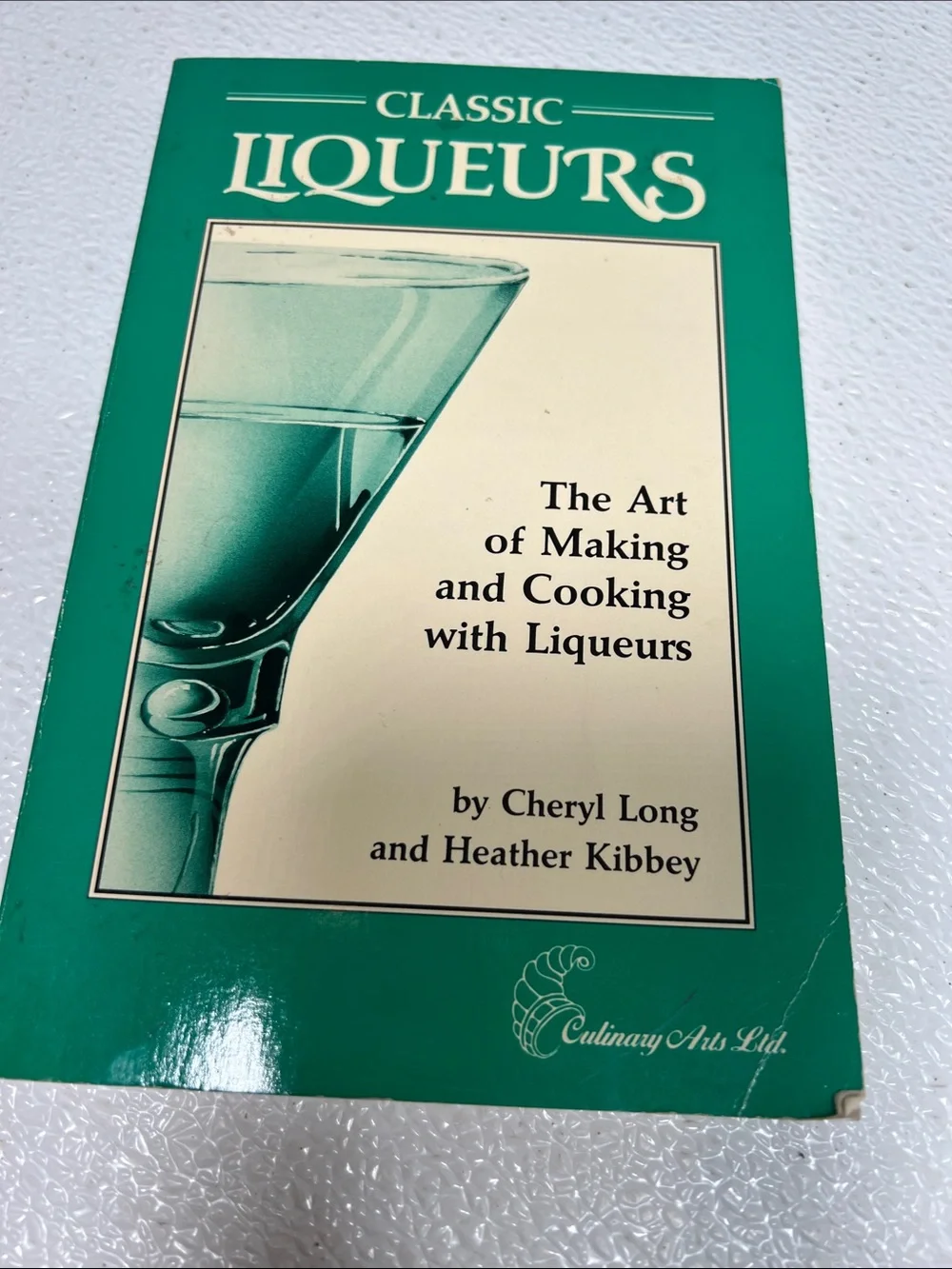 1990 Classic Liqueurs Cookbook by Cheryl Long & Heather Kibbey